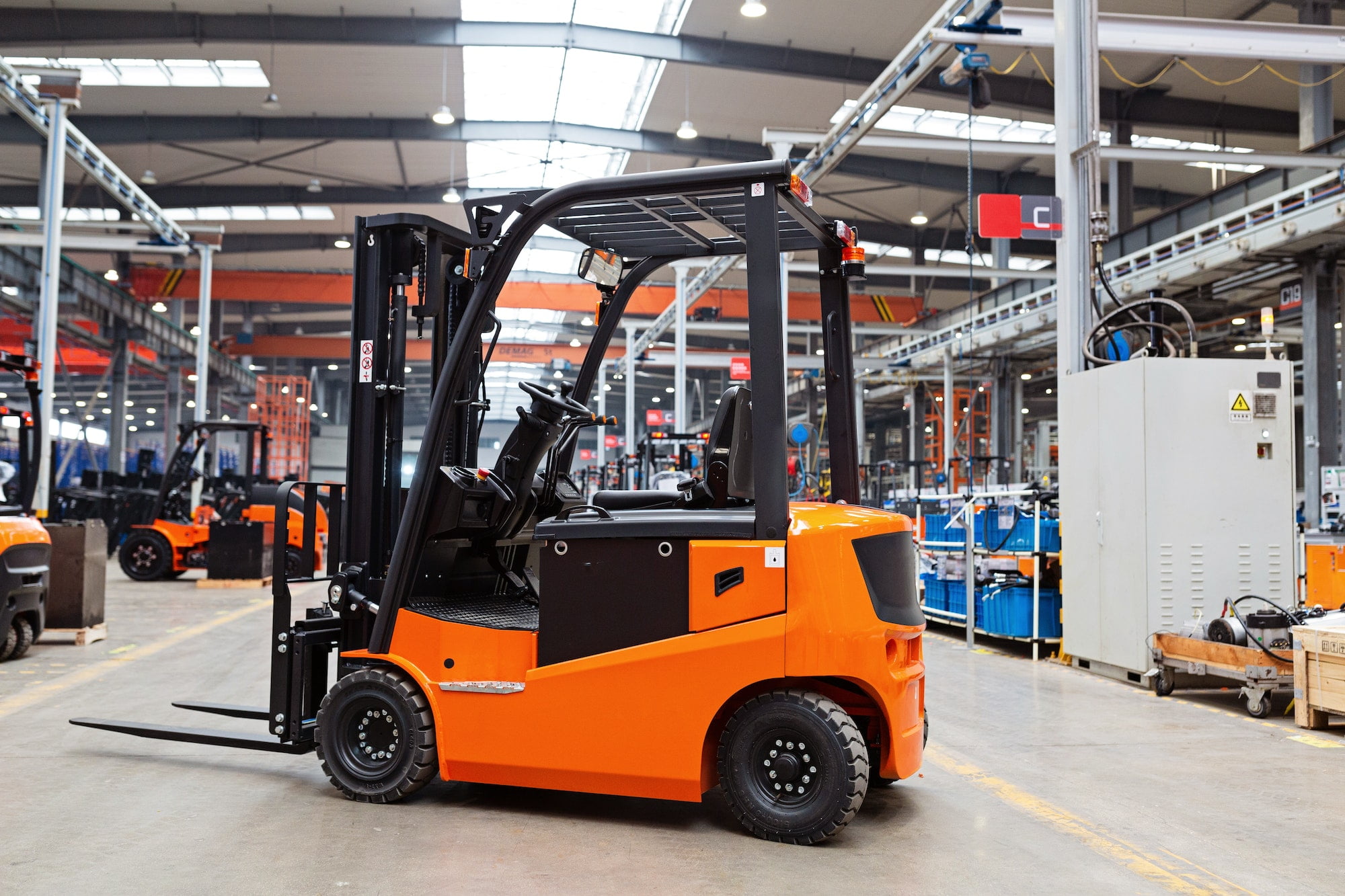 New forklift is standing on modern warehouse