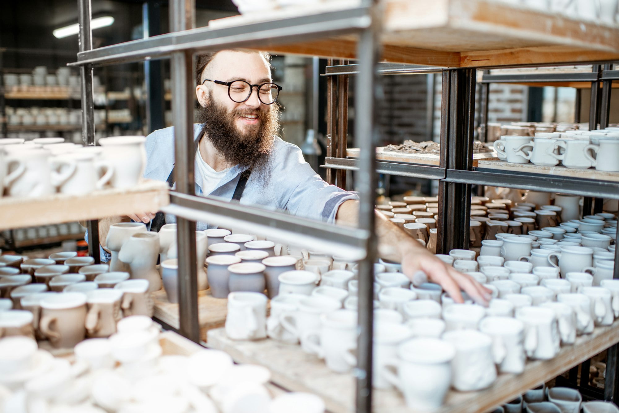 Worker at the warehouse of the pottery